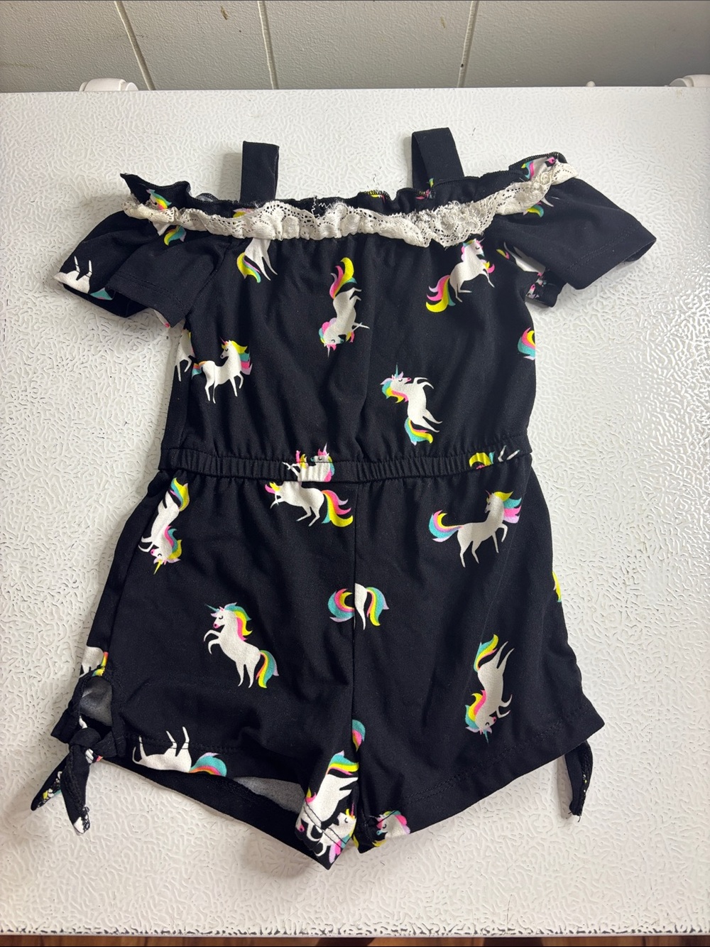 491 - One Step Ahead Black Unicorn Print Romper with Lace Trim